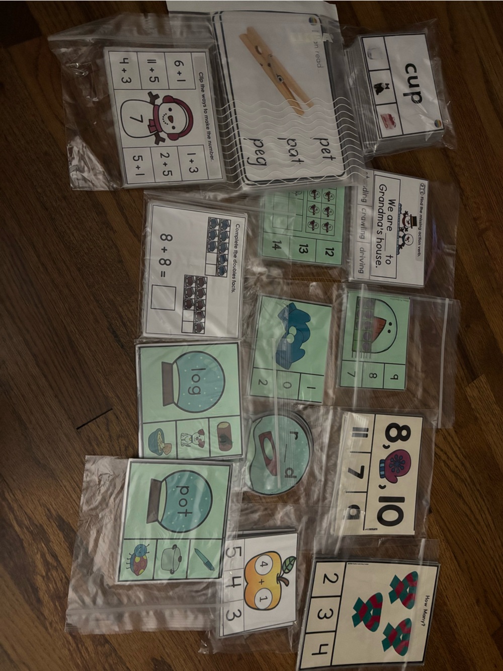Lot of laminated clip learning activities math language